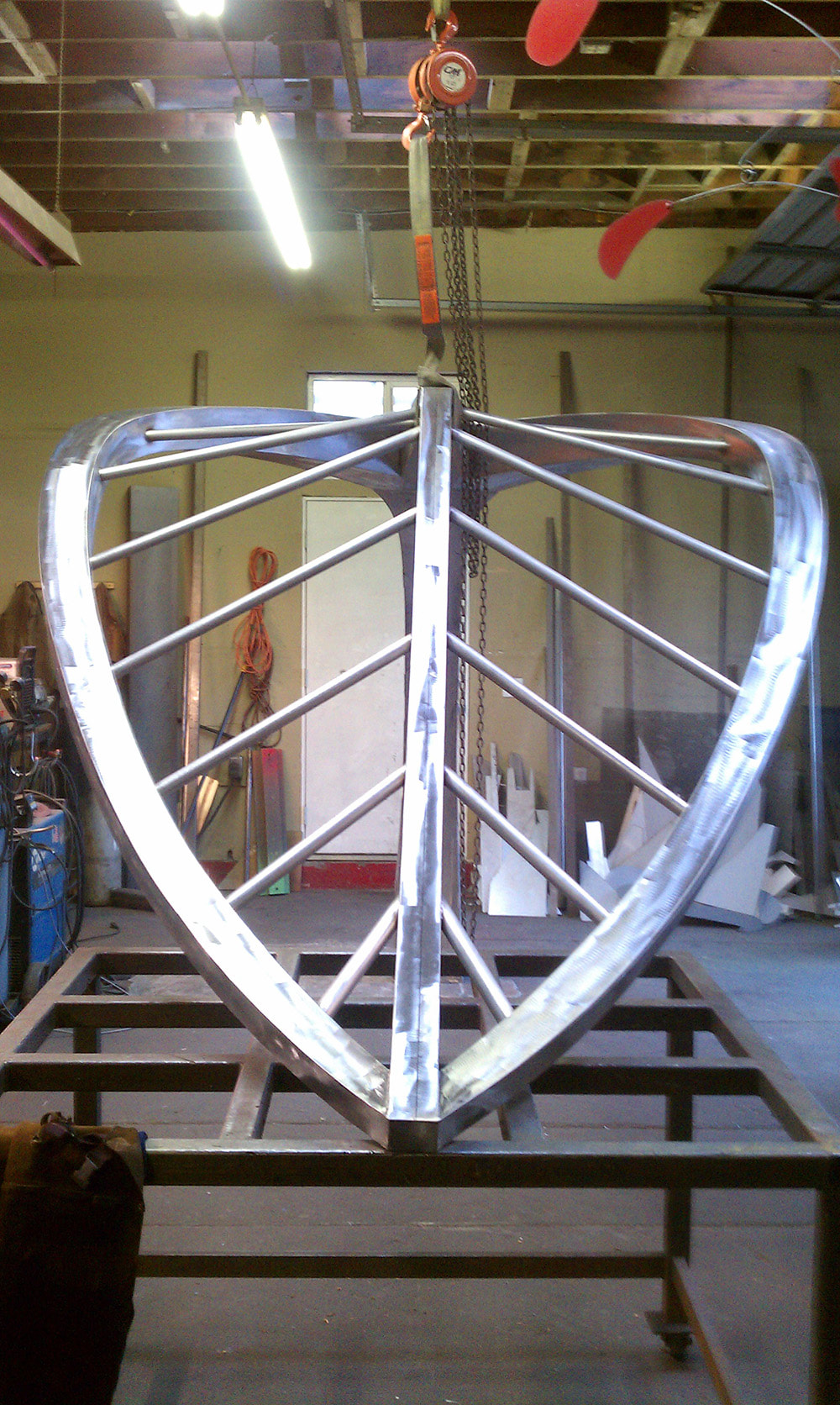 fabrication of stainless steel sculpture hanging from ceiling