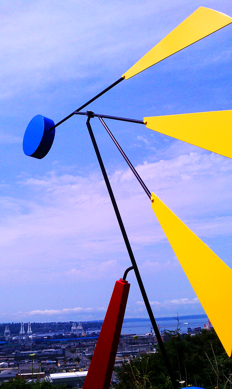 outdoor colorful kinetic sculpture  in san francisco with blue sky backround